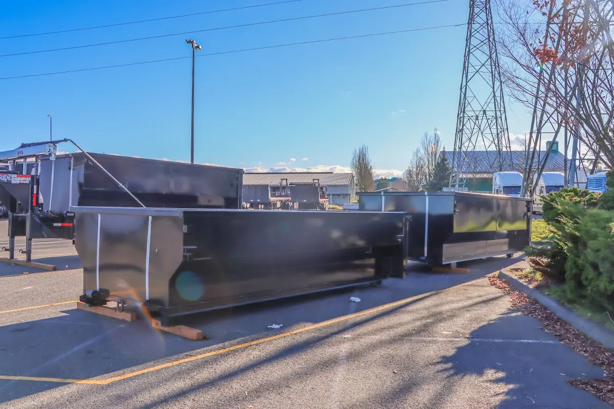 Roll-off dumpster ready for waste disposal at job site for Commercial Dumpster Rental in Winchester